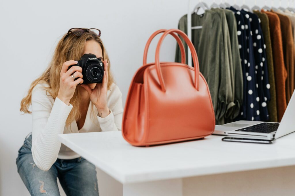 Selling your stuff online for free: eBay gets rid of fees for private sellers
Woman taking a picture of a bag